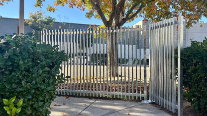 illustrate methods to install a steel privacy panel: staked into concrete, anchored to a slab, or free-standing with legs.
